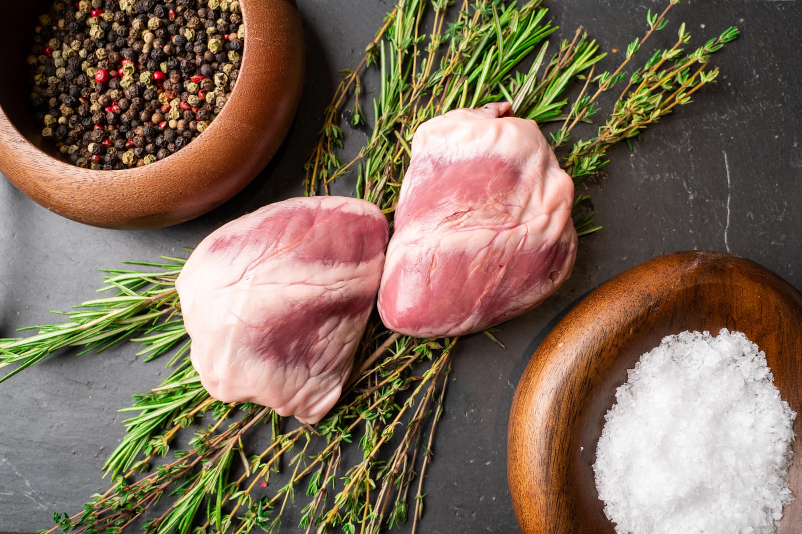 Lamb hearts on herbs